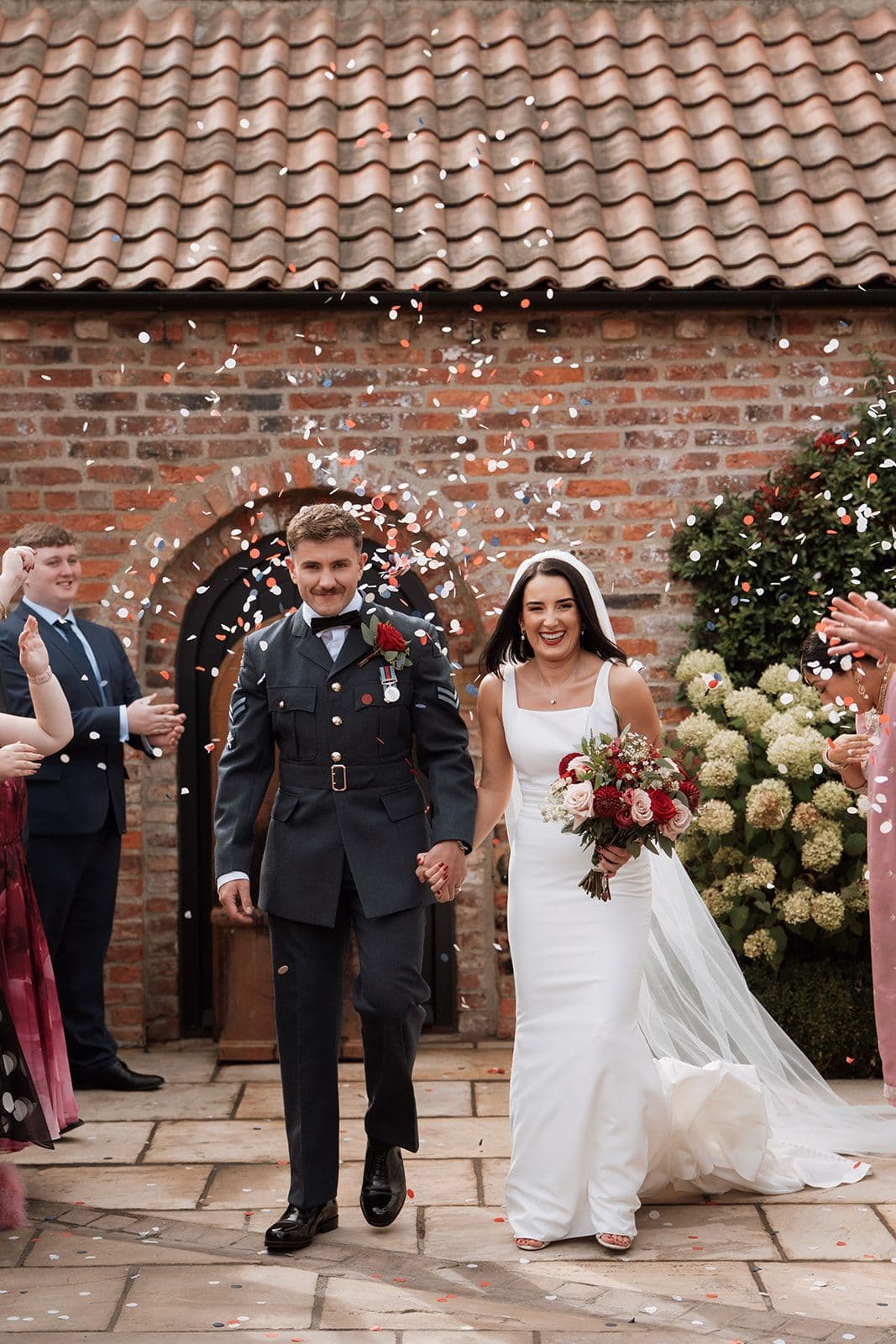 Molly and Conall in the courtyard at Thirsk Lodge Barns