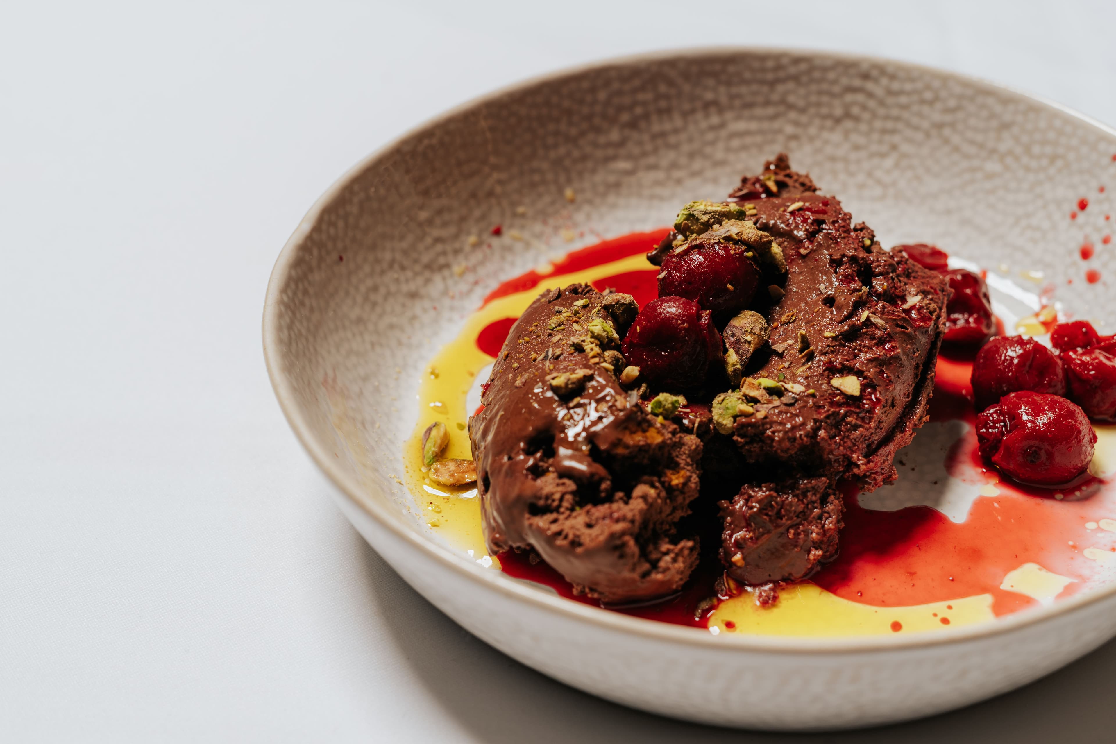 Chocolate mousse with boozy cherries, roasted pistachios and olive oil on the Wedding Winter Menu from Peckish, Thirsk Lodge Barns