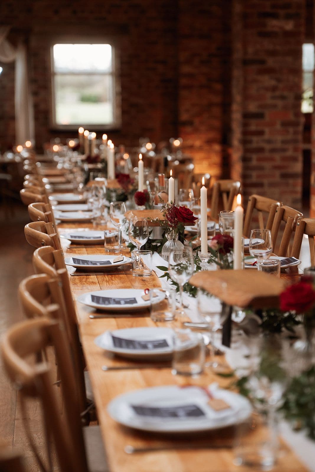 soft florals and elegant place settings at Thirsk Lodge Barns